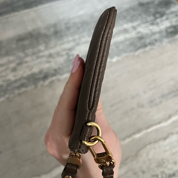 Like ๐ Louis Vuitton Empriente Citadine leather muted taupe mini pouch wristlet - Picture 11 of 17